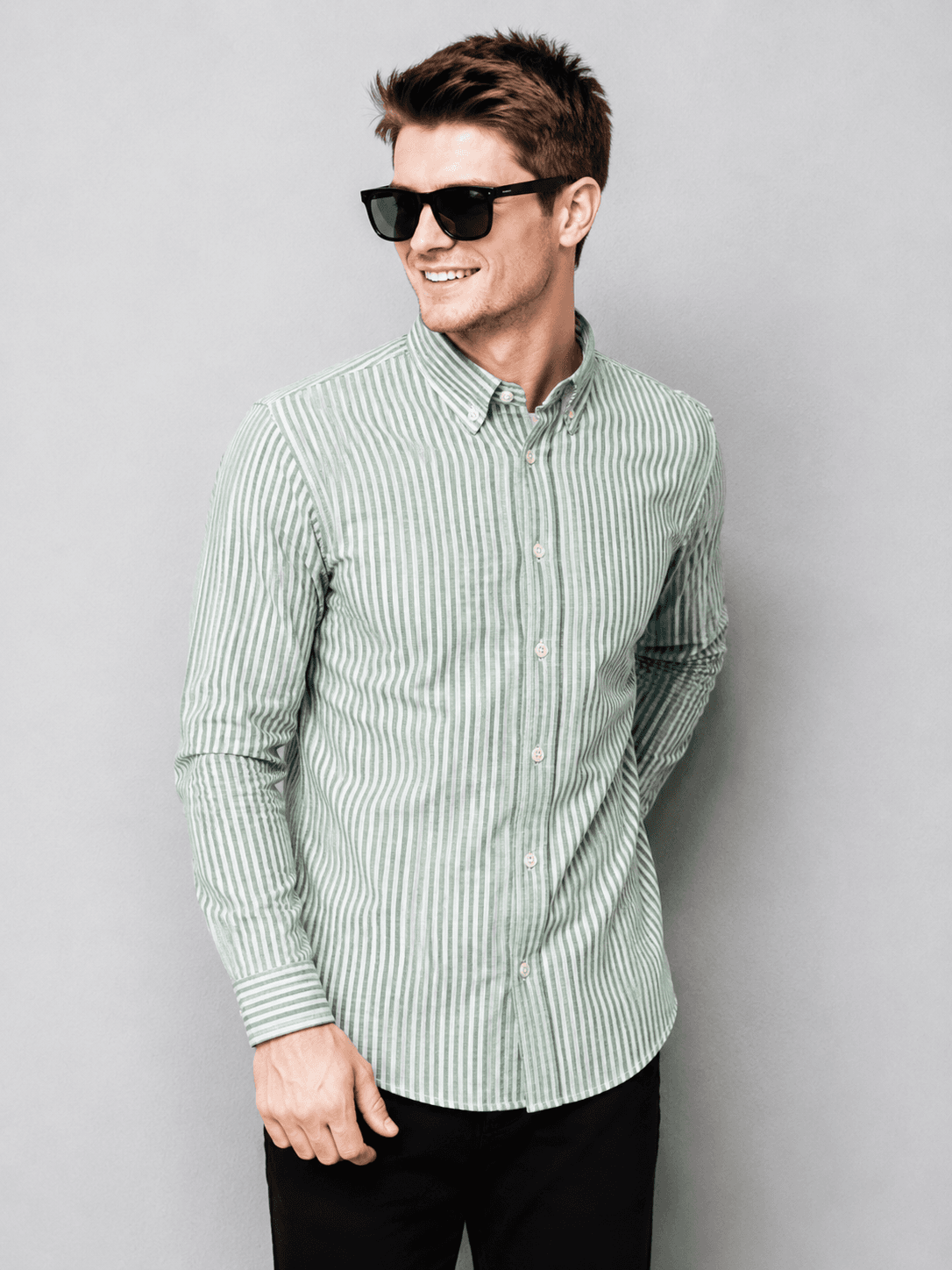Model wearing a green and white striped shirt