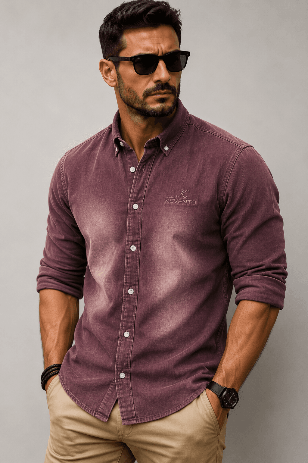 Model wearing a faded burgundy button-down shirt with Kevento logo embroidery