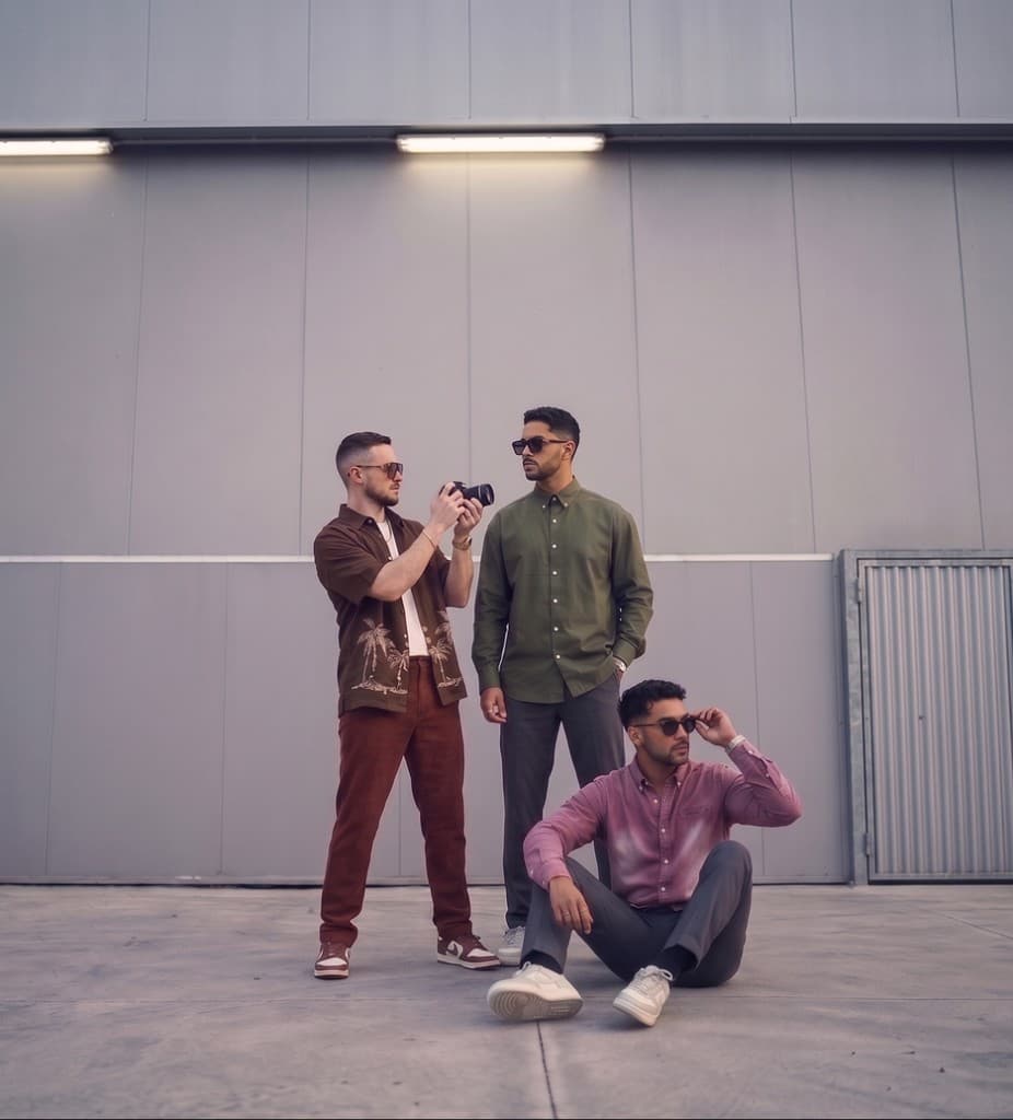 Three models wearing Kevento shirts in an urban setting