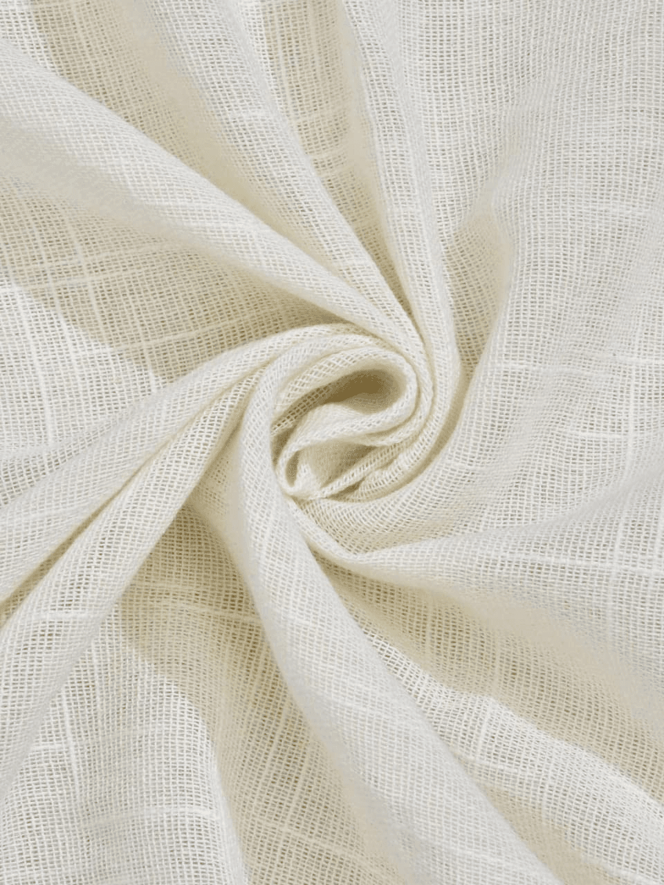 Close-up of white linen fabric arranged in a soft swirl